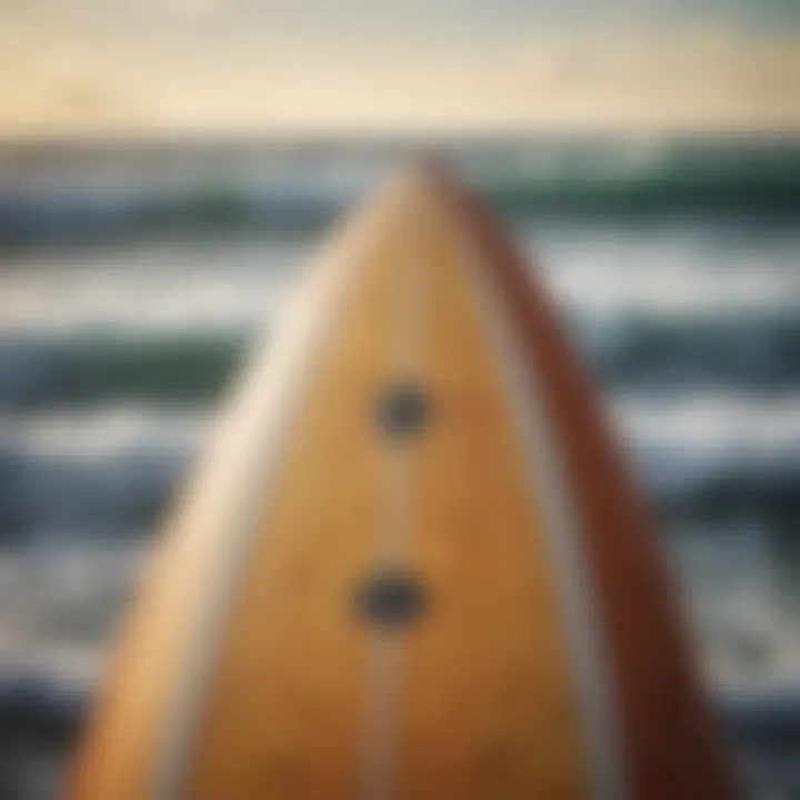 Close-up of a surfboard on the beach