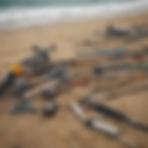 A selection of surf fishing rods and reels displayed on a sandy beach