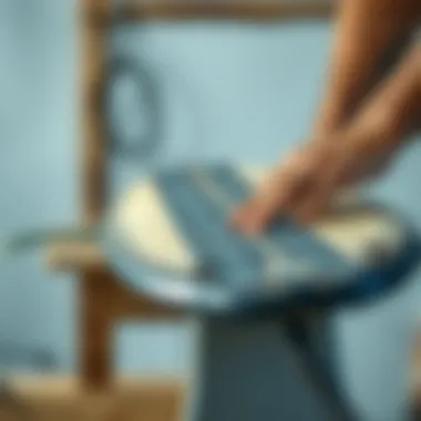 Applying Grip Tape to a Surfboard Surfboard being prepared with grip tape application