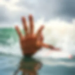 A surfer displaying the shaka sign in the water