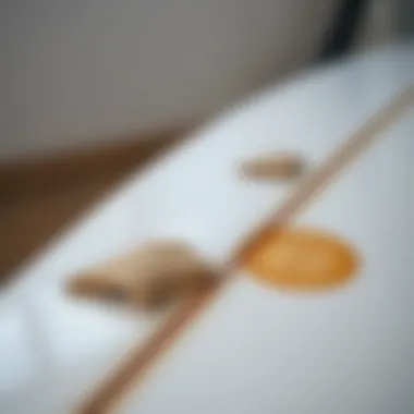 Repair Details on a Surfboard A finely detailed surfboard with visible repairs showcasing fibreglass patches