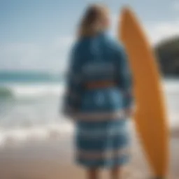 A vibrant changing robe hanging on a surfboard