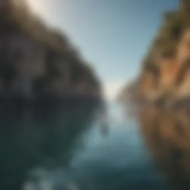 A paddleboarder exploring a scenic coastline