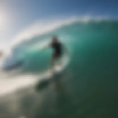 Skimboarder riding a wave along the coastline