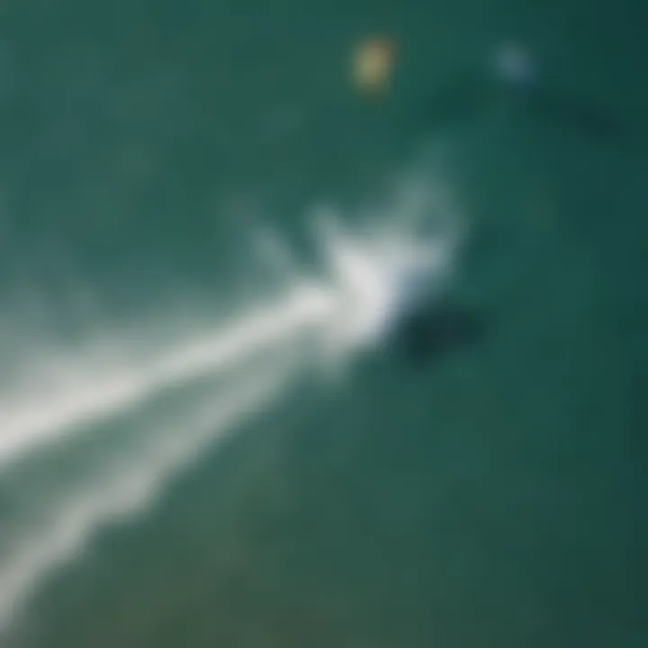 An aerial view of kitesurfers enjoying the waves