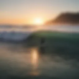 A stunning sunset over Ocean Beach, showcasing the waves and surfers