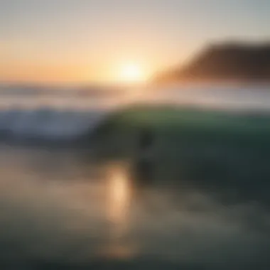 A stunning sunset over Ocean Beach, showcasing the waves and surfers