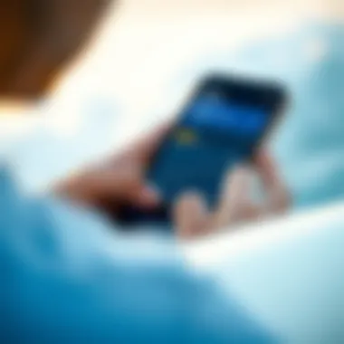 Utilizing Technology for Optimal Surfing Close-up of a surfer reading Surfline forecasts on a mobile device