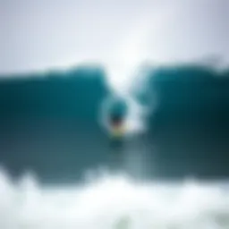 Surfer riding a wave in Dominical