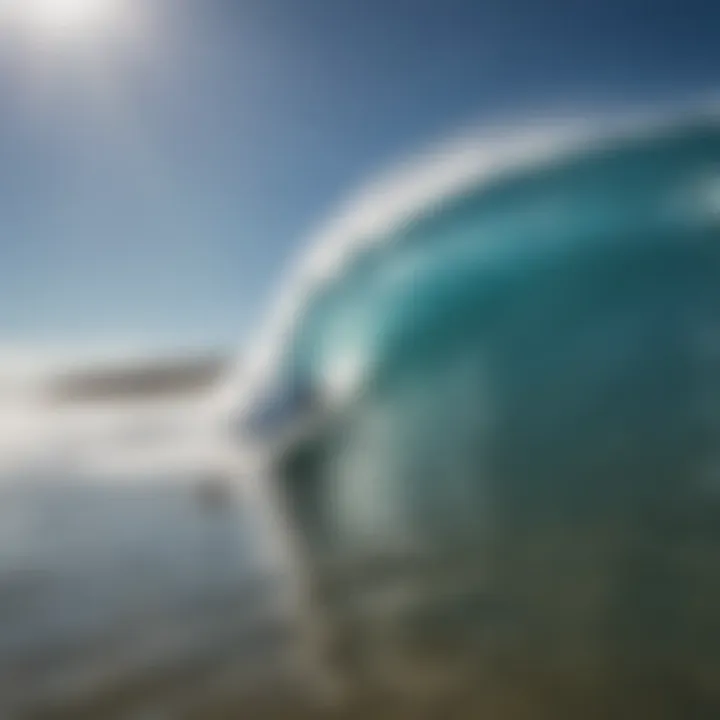 A group of surfers waiting for the perfect wave under a clear blue sky.