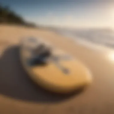 Essential skim boarding gear laid out on a sandy beach.