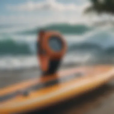 G-Shock tide watch on a surfboard beside the ocean