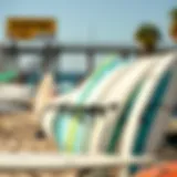 Surfboards lined up on the beach ready for rental