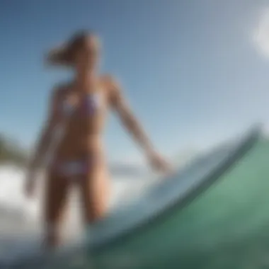 Perfect Fit: Hurley Bikini in Action for Surfing A surfer wearing a perfectly fitting Hurley bikini on the beach