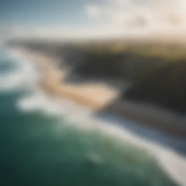 An aerial view of diverse terrains suitable for kiteboarding on land including fields and dunes