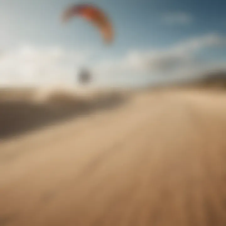 A kiteboarder gliding over a sandy landscape showcasing the thrill of land kiteboarding