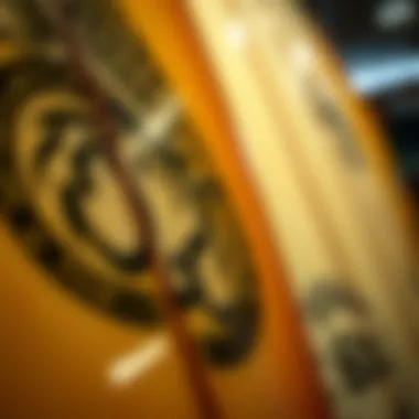 Quality Craftsmanship in Surfboards A close-up of a surfboard with detailed graphics, emphasizing craftsmanship and quality.