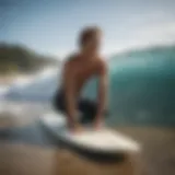 A surfer stretching on the beach before hitting the waves