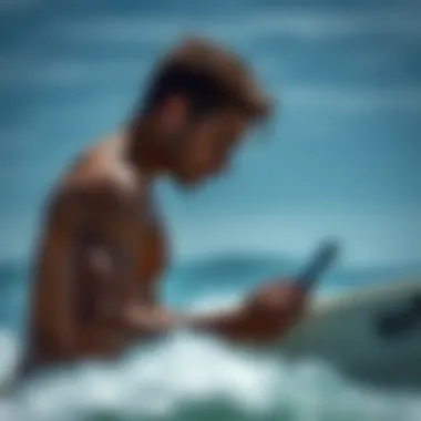 Surfer Using Mobile App for GPS Tracking Surfer Using Mobile App for GPS Tracking