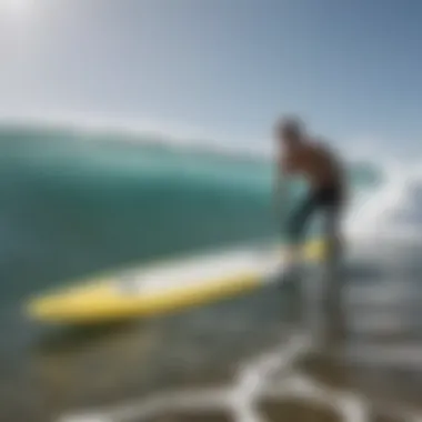 Surfer testing fin setups in water