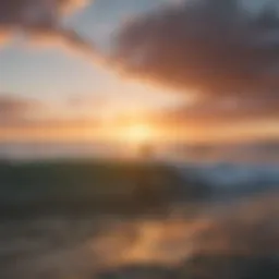 Sunset over the Pacific Ocean with surfers catching waves