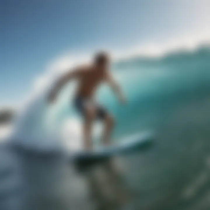 Person riding a wave wearing trendy board shorts