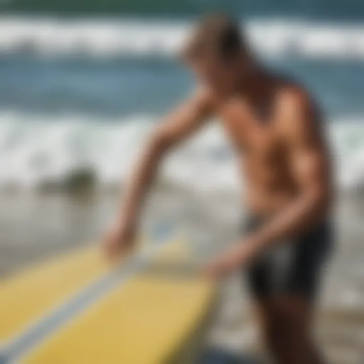 An expert demonstrating the technique of wax removal from a surfboard