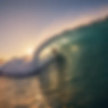 A surfer riding a wave at sunset