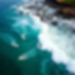 Aerial view of surfers riding waves in Central America