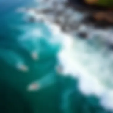 Surfers Riding the Waves Aerial view of surfers riding waves in Central America