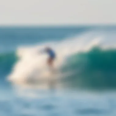 Surfing in Ideal Wave Conditions Surfer riding a wave in optimal conditions