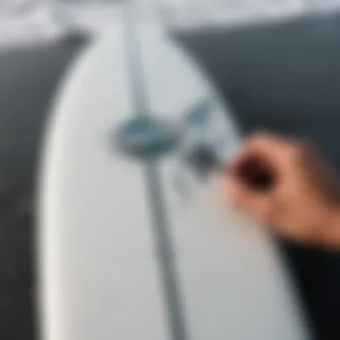 Maintenance tools for surf key holders on a surfboard